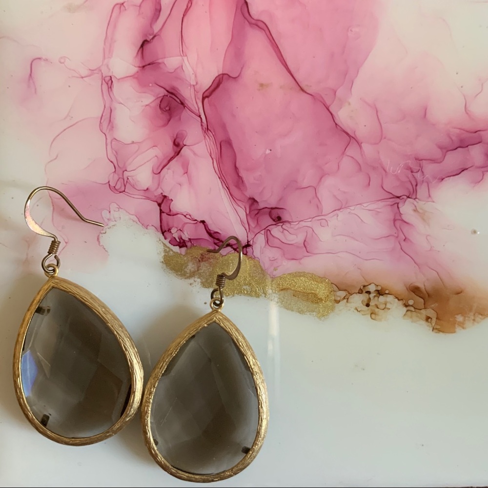 Topaz tear drop earring with gold embellishment